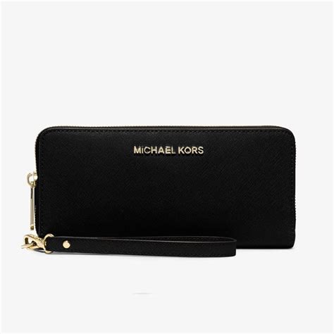 cartera continental michael kors|Michael Kors wristlet purse.